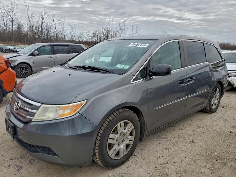 HONDA ODYSSEY LX 2011 with VIN 5FNRL5H22BB098518 - Photo from auction