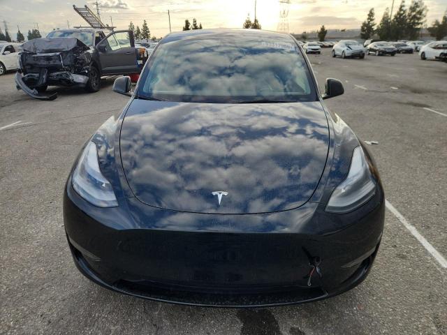 Photo 5 from auction – 2023 TESLA MODEL Y with VIN 7SAYGAEE3PF702255