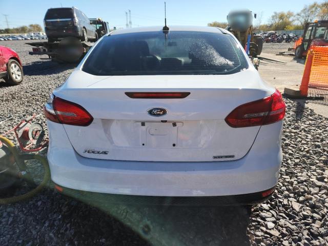 Photo 6 from auction – 2015 FORD FOCUS S with VIN 1FADP3E26FL321689