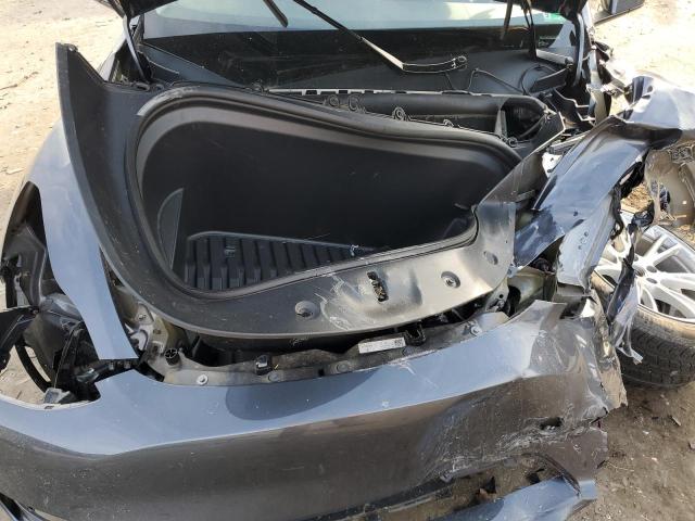 Photo 12 from auction – 2023 TESLA MODEL Y with VIN 7SAYGDED5PF946417