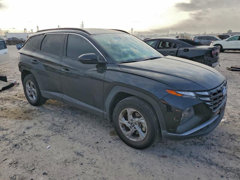 Photo 4 from auction – 2022 HYUNDAI TUCSON SEL with VIN 5NMJBCAE5NH097889