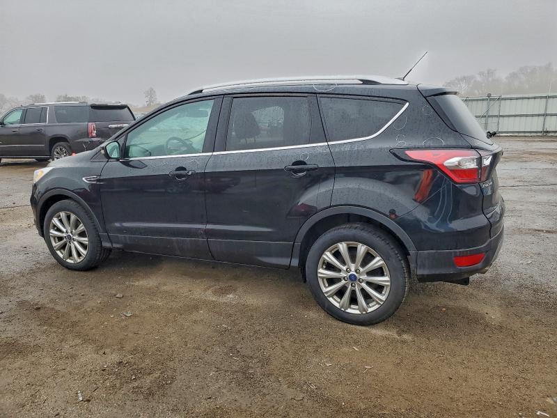 Photo 2 from auction – 2017 FORD ESCAPE TIT with VIN 1FMCU0JD1HUD27834