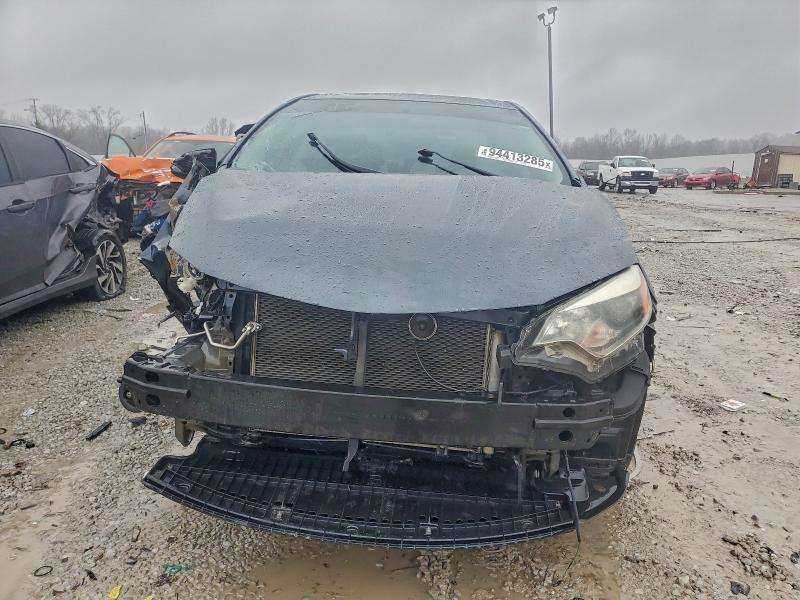 Photo 5 from auction – 2014 TOYOTA COROLLA L with VIN 5YFBURHE2EP097653