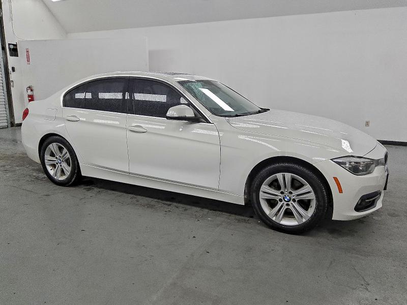 Photo 4 from auction – 2018 BMW 330 I with VIN WBA8B9G58JNU97187