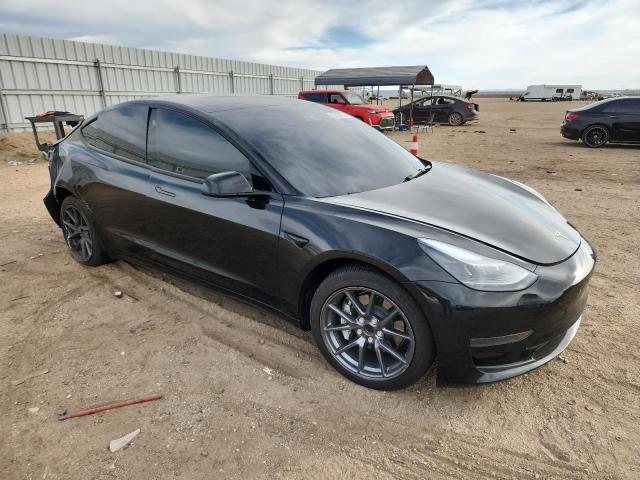 Photo 4 from auction – 2023 TESLA MODEL 3 with VIN 5YJ3E1EAXPF571559
