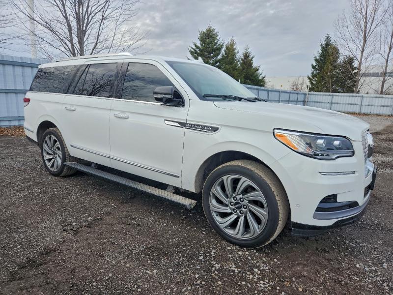 Photo 4 from auction – 2022 LINCOLN NAVIGATOR with VIN 5LMJJ3LT9NEL07727