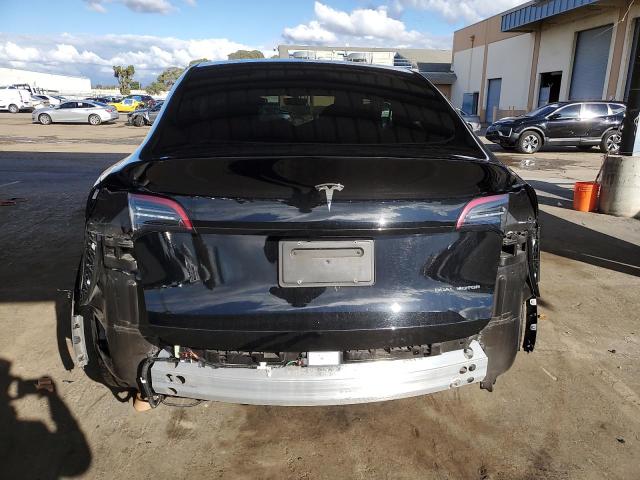 Photo 6 from auction – 2023 TESLA MODEL Y with VIN 7SAYGAEE5PF900917