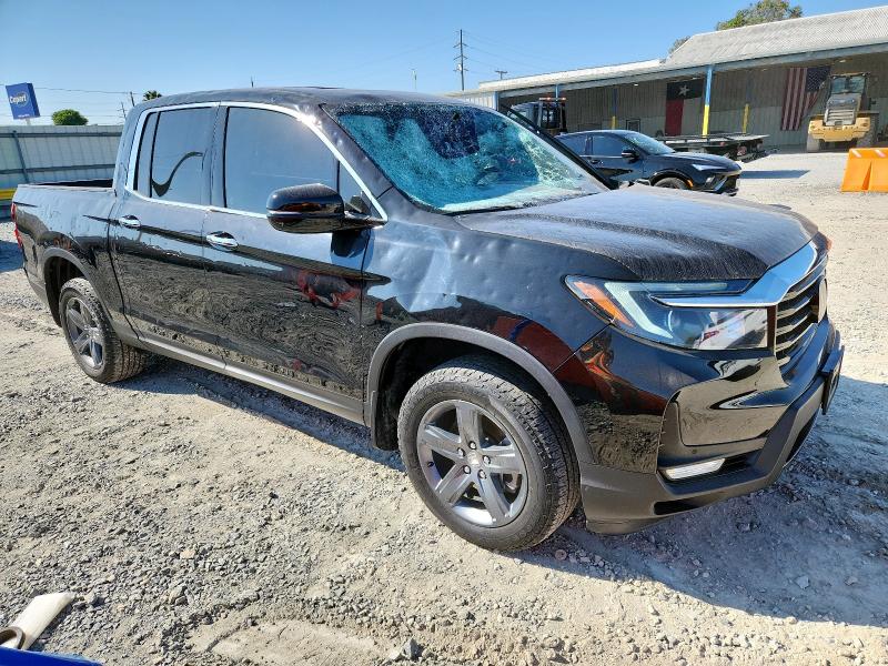 Photo 4 from auction – 2023 HONDA RIDGELINE with VIN 5FPYK3F77PB065787