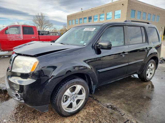 HONDA PILOT SE 2015 with VIN 5FNYF4H39FB048128 - Photo from auction