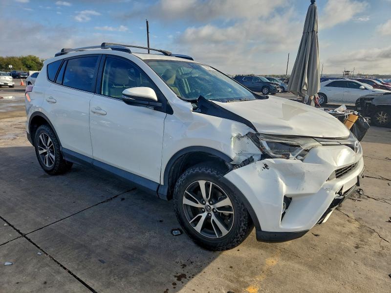 Photo 4 from auction – 2016 TOYOTA RAV4 XLE with VIN JTMWFREV9GJ083871