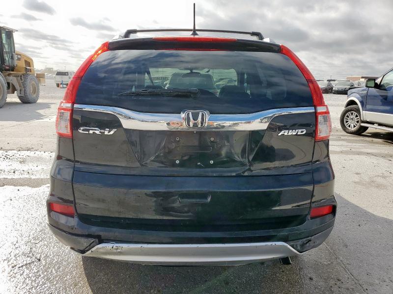 Photo 6 from auction – 2015 HONDA CR-V EXL with VIN 5J6RM4H74FL004932