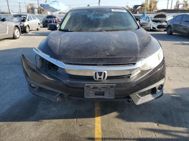 Photo 5 from auction – 2016 HONDA CIVIC EX with VIN 2HGFC1F48GH658495
