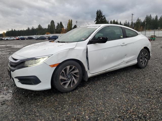 HONDA CIVIC LX 2018 with VIN 2HGFC4B06JH303594 - Photo from auction