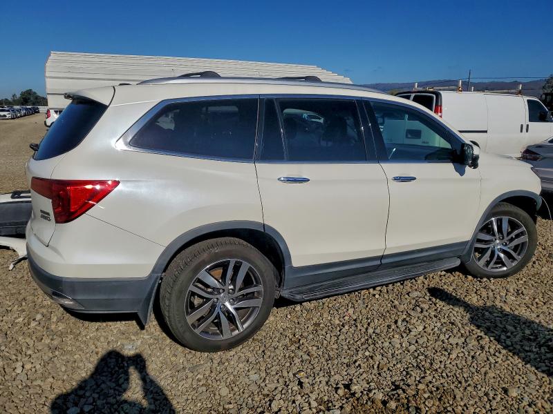Photo 3 from auction – 2017 HONDA PILOT TOUR with VIN 5FNYF6H98HB012675