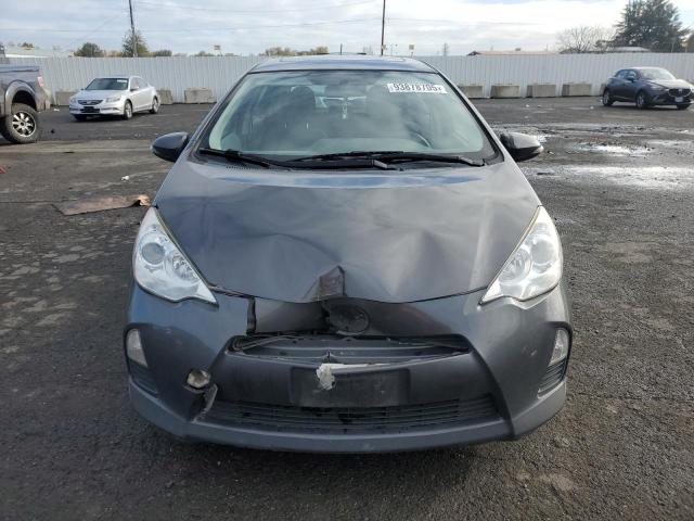 Photo 5 from auction – 2014 TOYOTA PRIUS C with VIN JTDKDTB35E1061447