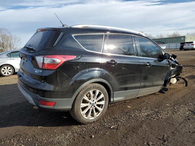 Photo 3 from auction – 2017 FORD ESCAPE TIT with VIN 1FMCU9J96HUB55445