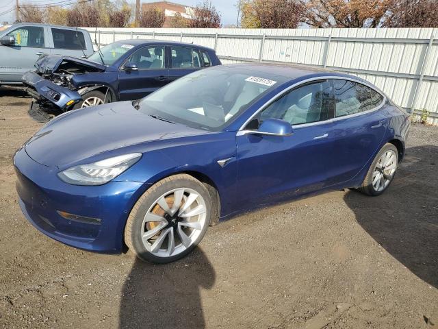 TESLA MODEL 3 2018 with VIN 5YJ3E1EBXJF097712 - Photo from auction
