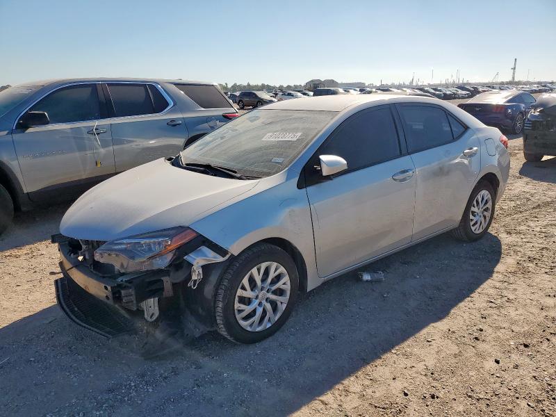 TOYOTA COROLLA L 2019 with VIN 5YFBURHE2KP945185 - Photo from auction