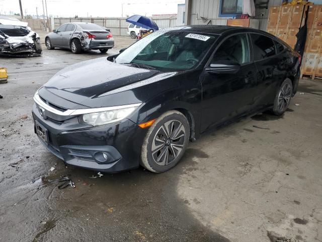 HONDA CIVIC EXL 2017 with VIN 2HGFC1F75HH644758 - Photo from auction