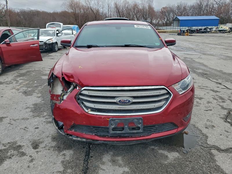 Photo 5 from auction – 2016 FORD TAURUS with VIN 1FAHP2E89GG131914