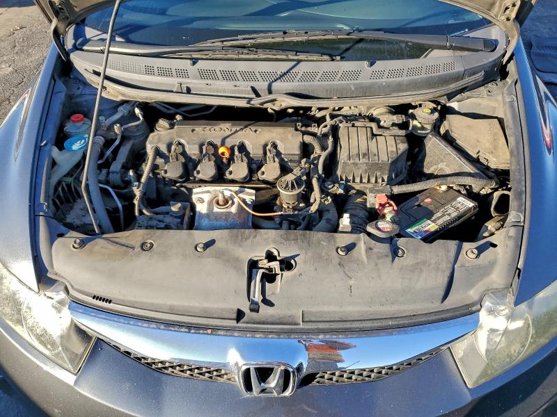 Photo 11 from auction – 2010 HONDA CIVIC EX with VIN 19XFA1F85AE072931