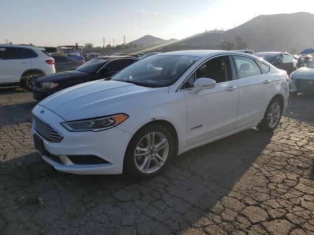 FORD FUSION SE 2018 with VIN 3FA6P0LU1JR118697 - Photo from auction