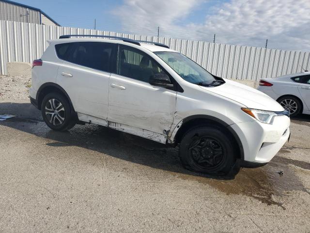 Photo 4 from auction – 2017 TOYOTA RAV4 LE with VIN JTMZFREV4HJ704075