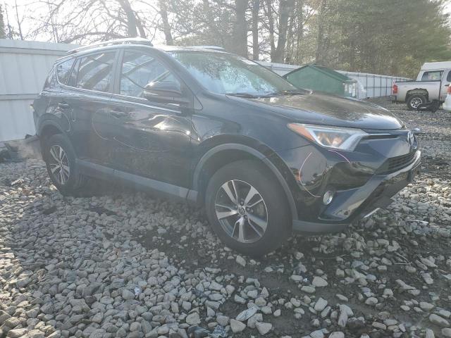 Photo 4 from auction – 2016 TOYOTA RAV4 XLE with VIN 2T3RFREVXGW444443