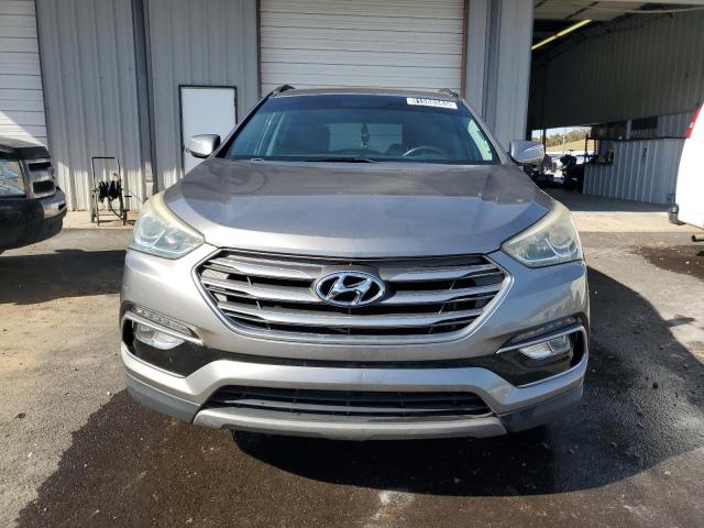 Photo 5 from auction – 2017 HYUNDAI SANTA FE S with VIN 5NMZU3LB8HH019949