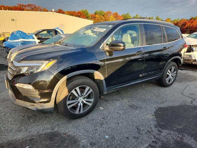 HONDA PILOT EXL 2016 with VIN 5FNYF6H85GB021775 - Photo from auction