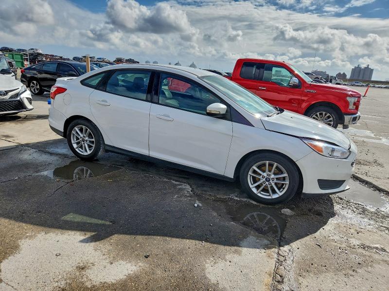 Photo 4 from auction – 2016 FORD FOCUS SE with VIN 1FADP3F20GL296692