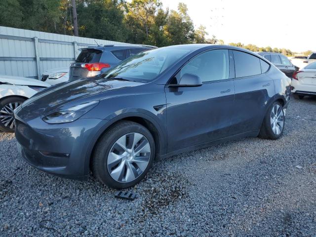 TESLA MODEL Y 2023 with VIN 7SAYGAEE9PF932561 - Photo from auction