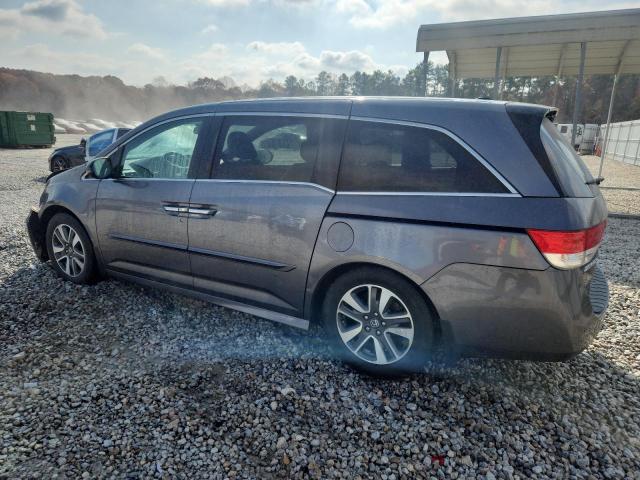 Photo 2 from auction – 2014 HONDA ODYSSEY TO with VIN 5FNRL5H97EB016946