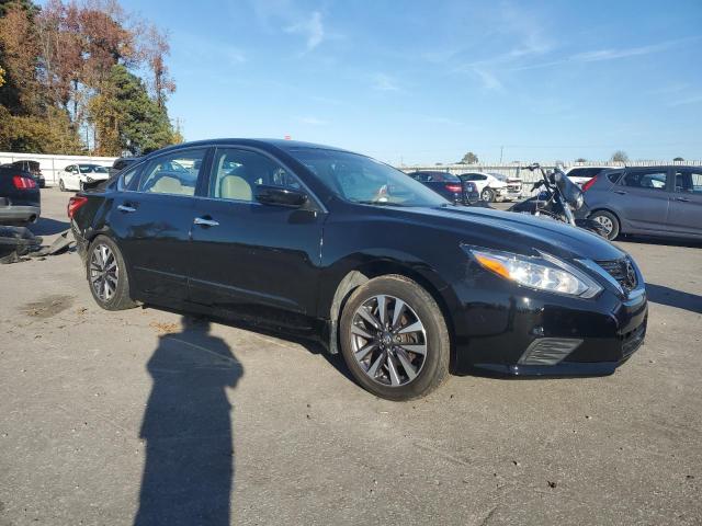 Photo 4 from auction – 2016 NISSAN ALTIMA 2.5 with VIN 1N4AL3AP0GN365063