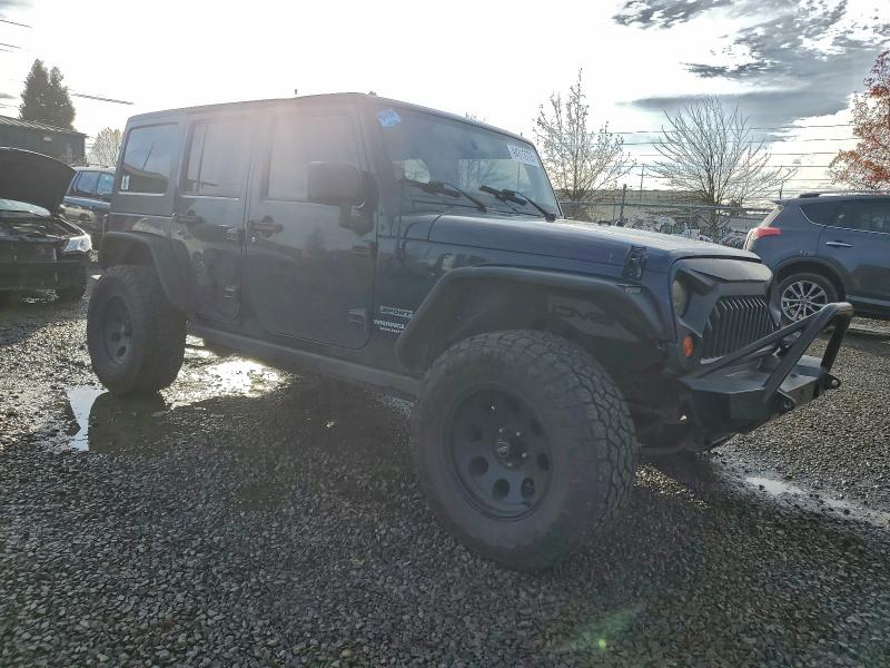 Photo 4 from auction – 2013 JEEP WRANGLER U with VIN 1C4BJWDG3DL559174