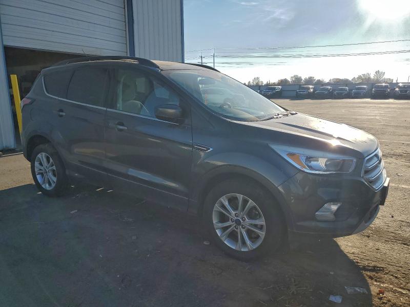 Photo 4 from auction – 2018 FORD ESCAPE SE with VIN 1FMCU9GD5JUC13417