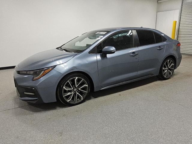 TOYOTA COROLLA SE 2022 with VIN 5YFS4MCE3NP106998 - Photo from auction