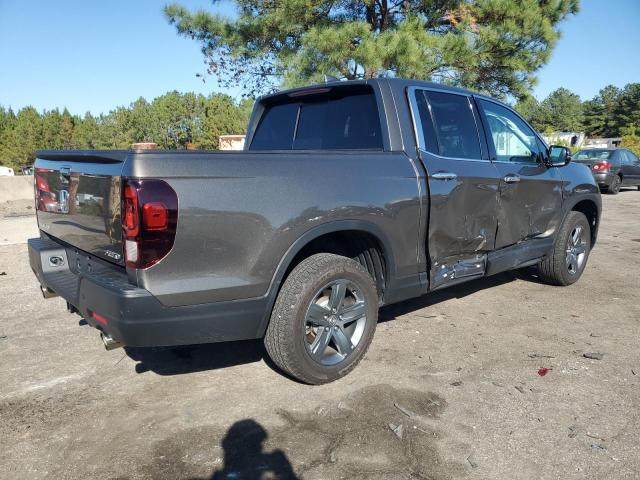 Photo 3 from auction – 2022 HONDA RIDGELINE with VIN 5FPYK3F73NB029687