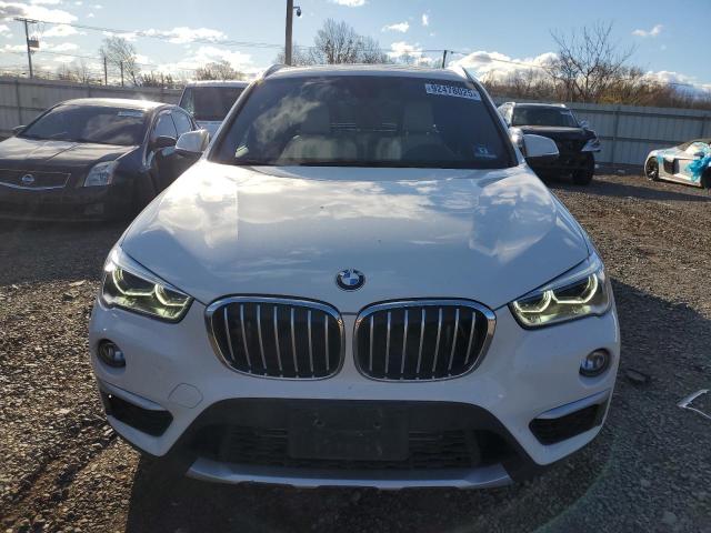 Photo 5 from auction – 2017 BMW X1 XDRIVE2 with VIN WBXHT3C36H5F85558