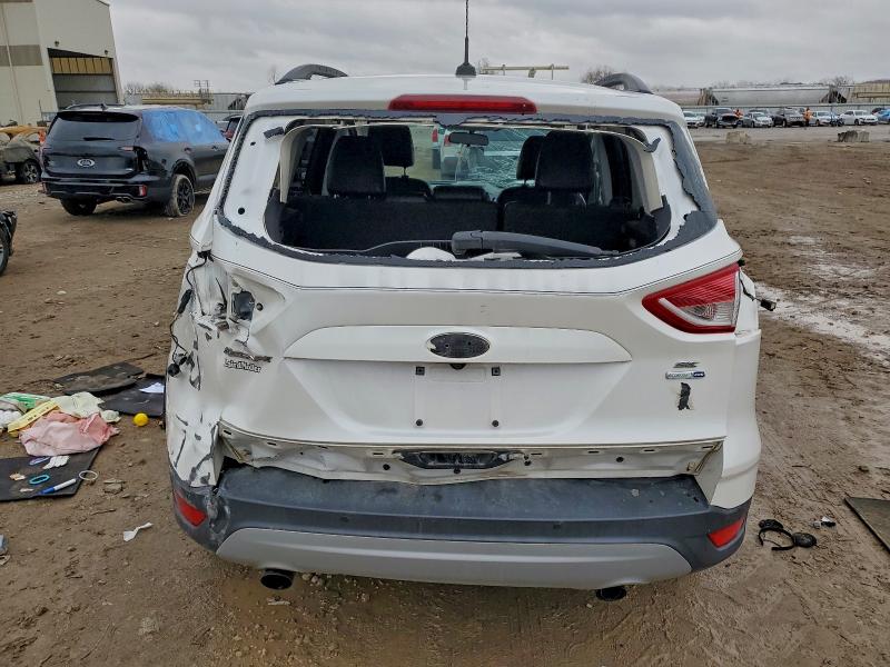 Photo 6 from auction – 2016 FORD ESCAPE SE with VIN 1FMCU9G98GUA57958