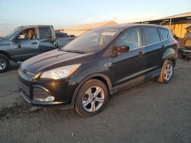 FORD ESCAPE 2014 with VIN 1FMCU9GX2EUC72070 - Photo from auction