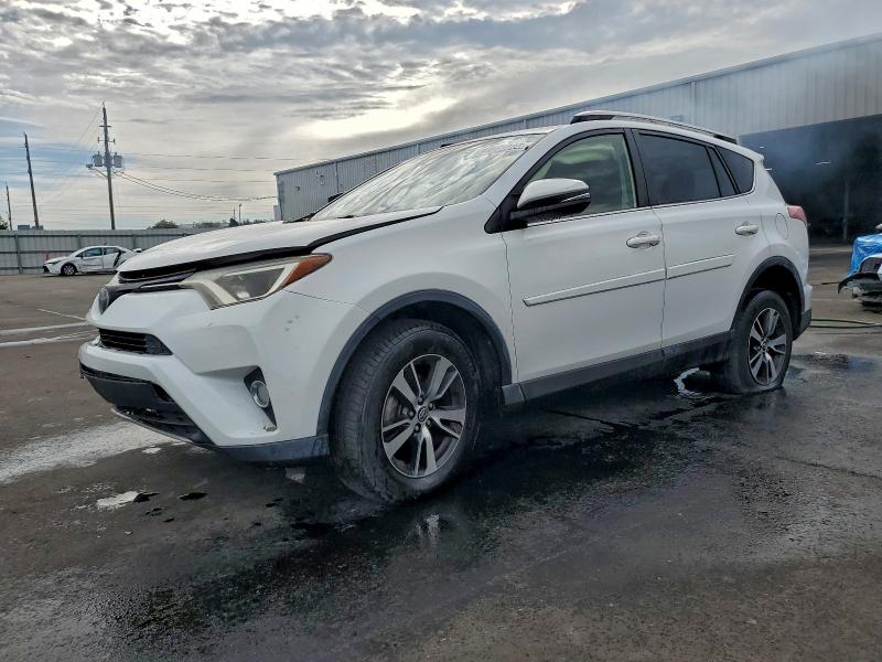 TOYOTA RAV4 XLE 2017 with VIN JTMWFREV0HD103506 - Photo from auction