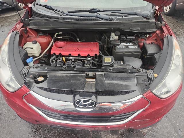 Photo 12 from auction – 2012 HYUNDAI TUCSON GLS with VIN KM8JUCAC0CU373535