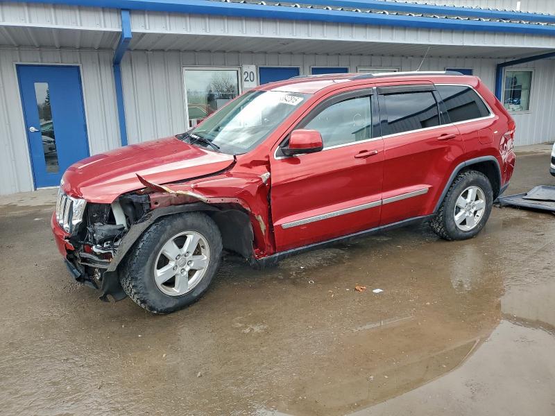 JEEP GRAND CHER 2011 with VIN 1J4RR4GG5BC512503 - Photo from auction