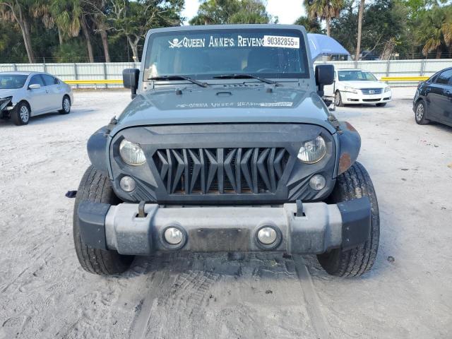 Photo 5 from auction – 2015 JEEP WRANGLER U with VIN 1C4BJWDG9FL734773