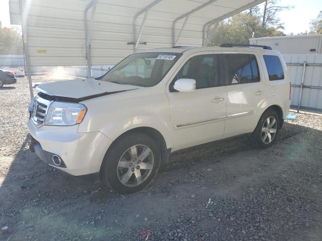 HONDA PILOT TOUR 2015 with VIN 5FNYF3H97FB017572 - Photo from auction