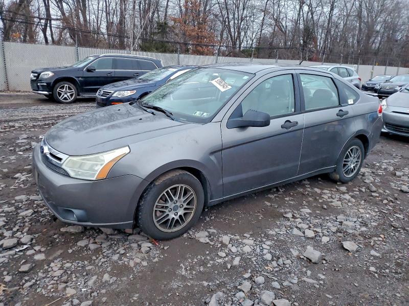 FORD FOCUS SE 2011 with VIN 1FAHP3FN7BW132035 - Photo from auction