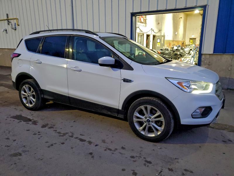 Photo 4 from auction – 2017 FORD ESCAPE SE with VIN 1FMCU9GD5HUD60816