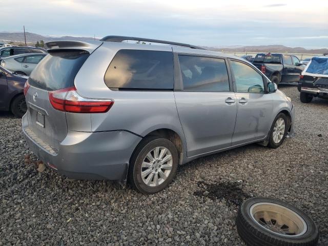 Photo 3 from auction – 2015 TOYOTA SIENNA XLE with VIN 5TDDK3DCXFS094993