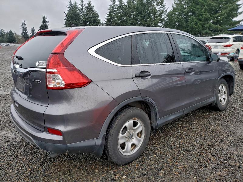 Photo 3 from auction – 2015 HONDA CR-V LX with VIN 2HKRM4H36FH617576